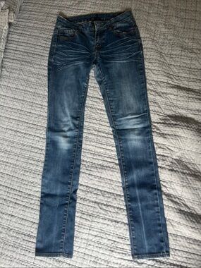 Women’s Dark Blue Skinny Jeans with Faded Detail